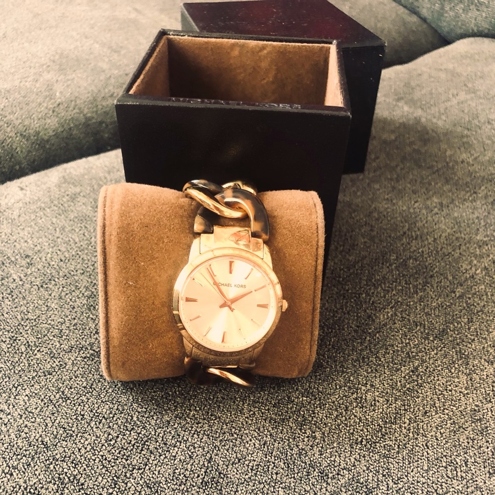 Michael Kors rose gold watch.